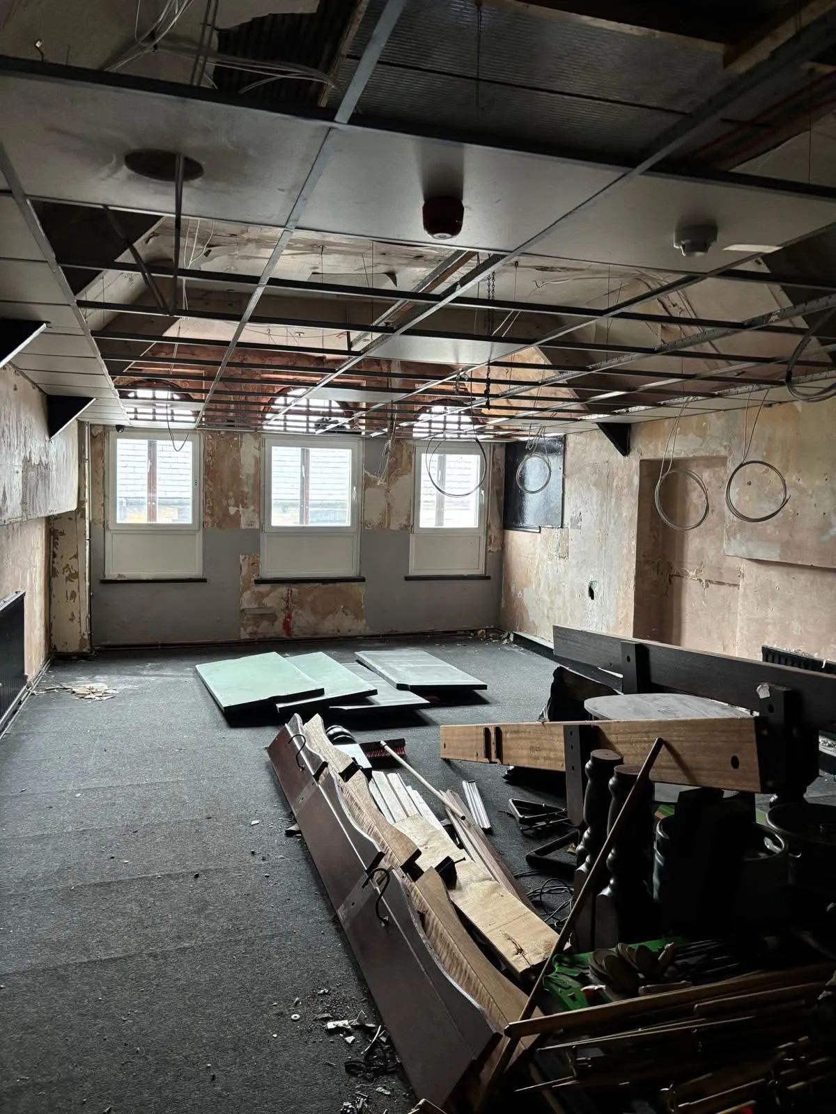 Strip-out at the Porth pool hall ahead of plastering and ceiling repair